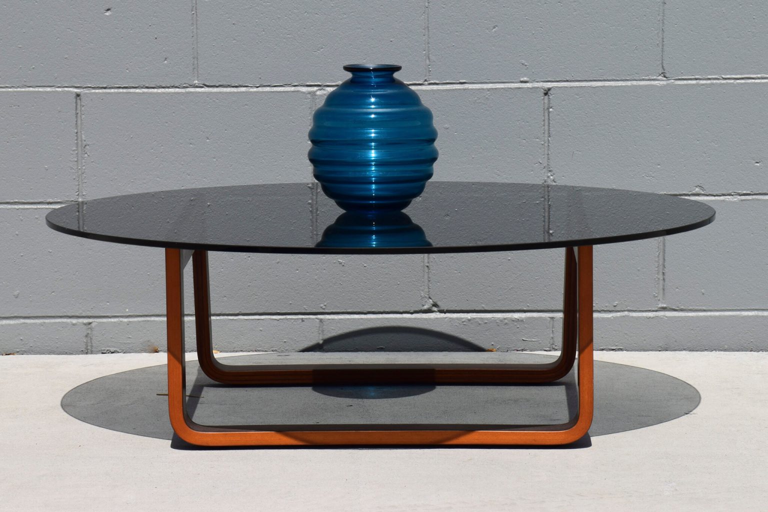 Mid-Century Round Smoked Glass Coffee Table - Structured Rebellion